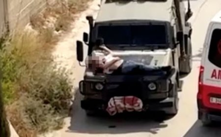 چھاپے کے دوران اسرائیلی فوج نے زخمی فلسطینی کو گاڑی سے باندھ دیا